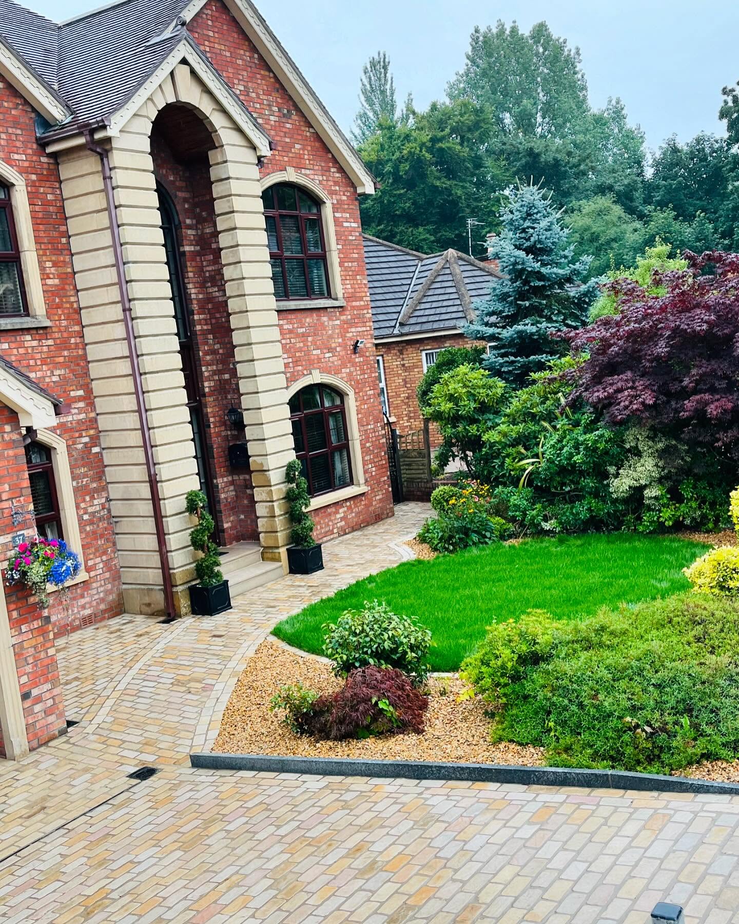 Modern driveway design Dromore for a large house