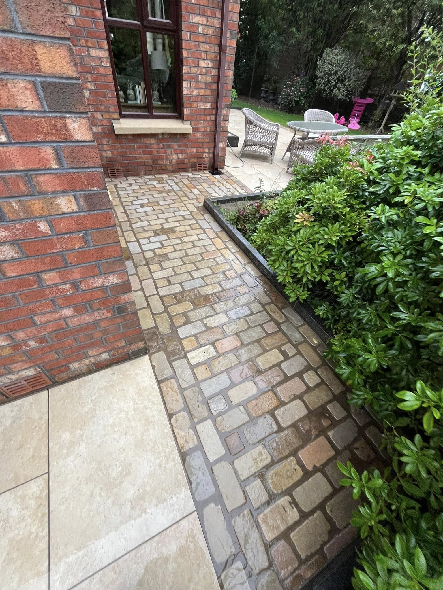 Paved walkway to backgarden, Comber