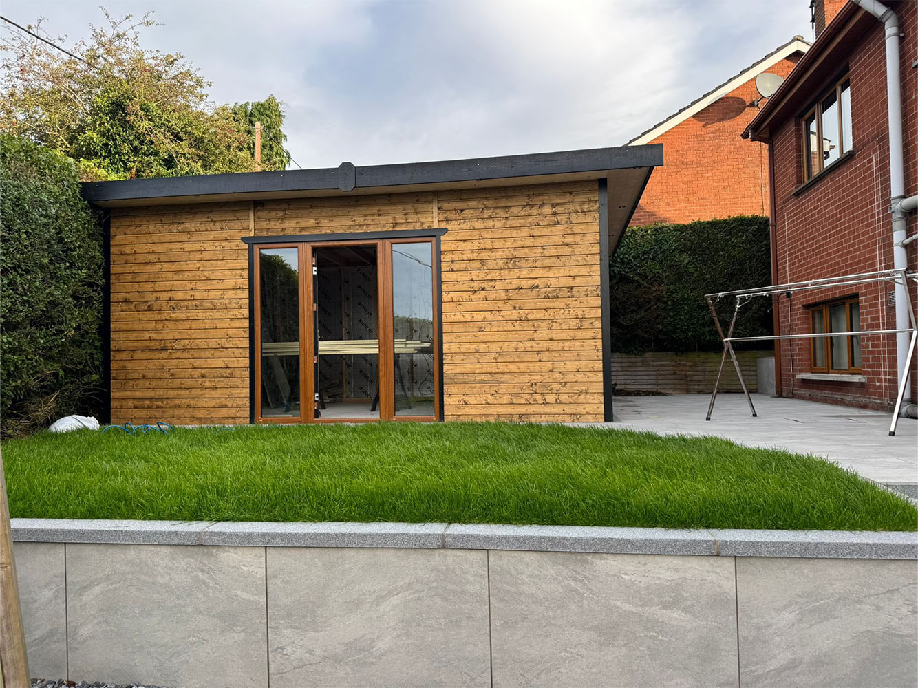 Complete garden renovation with a modern wooden outdoor shed Banbridge